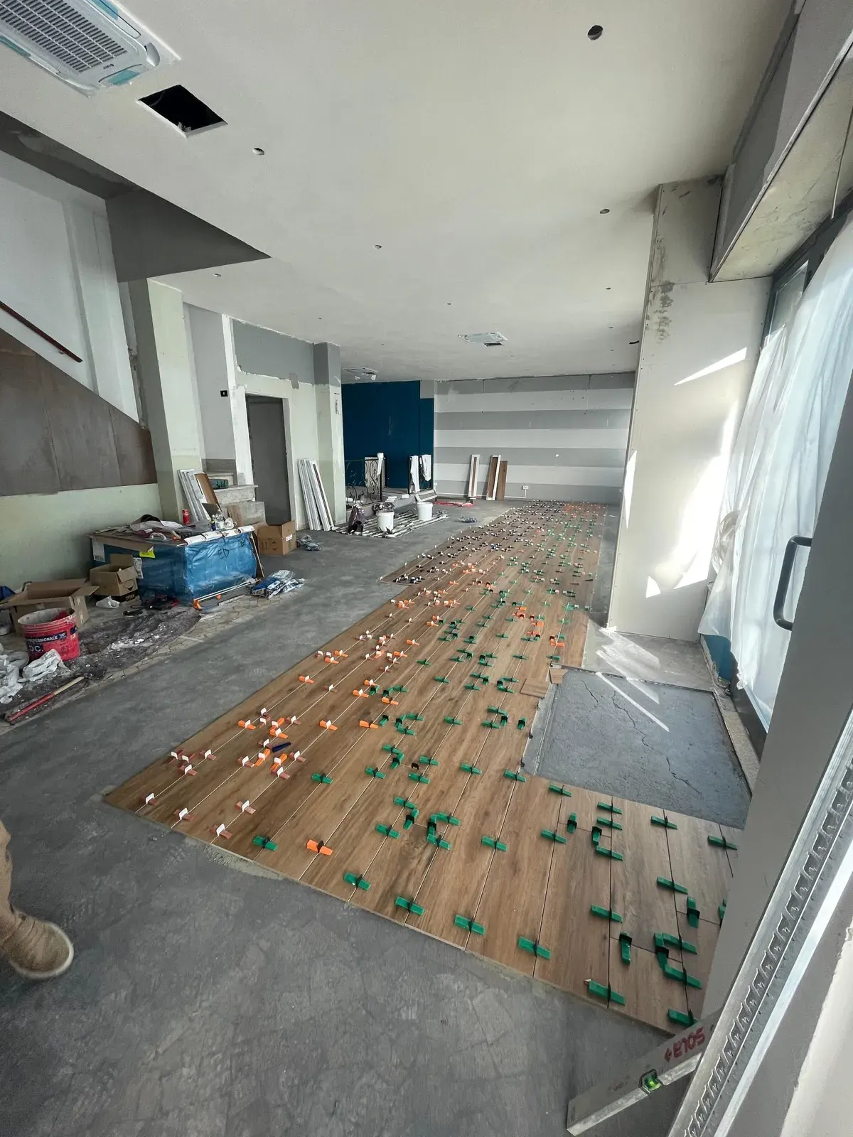 Laying the floor on the bar building site